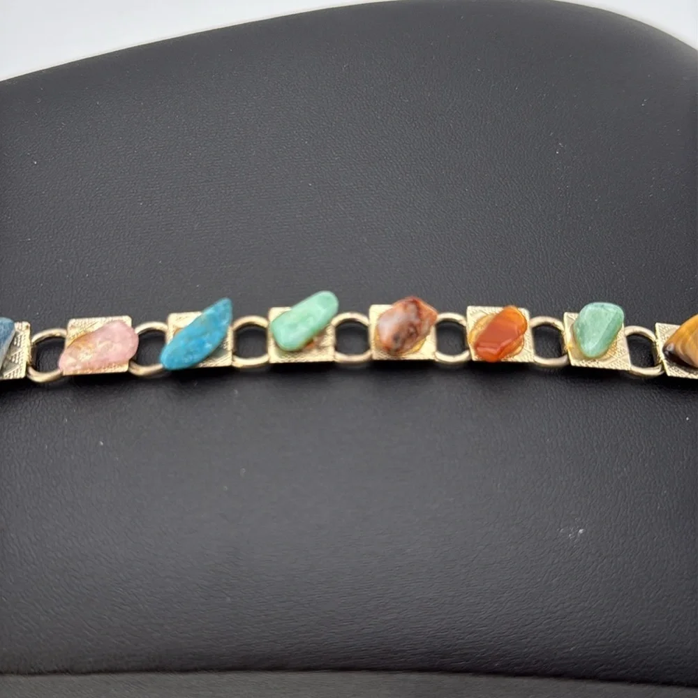 Vintage Gold tone link charm bracelet with various colored “stones” boho hippie